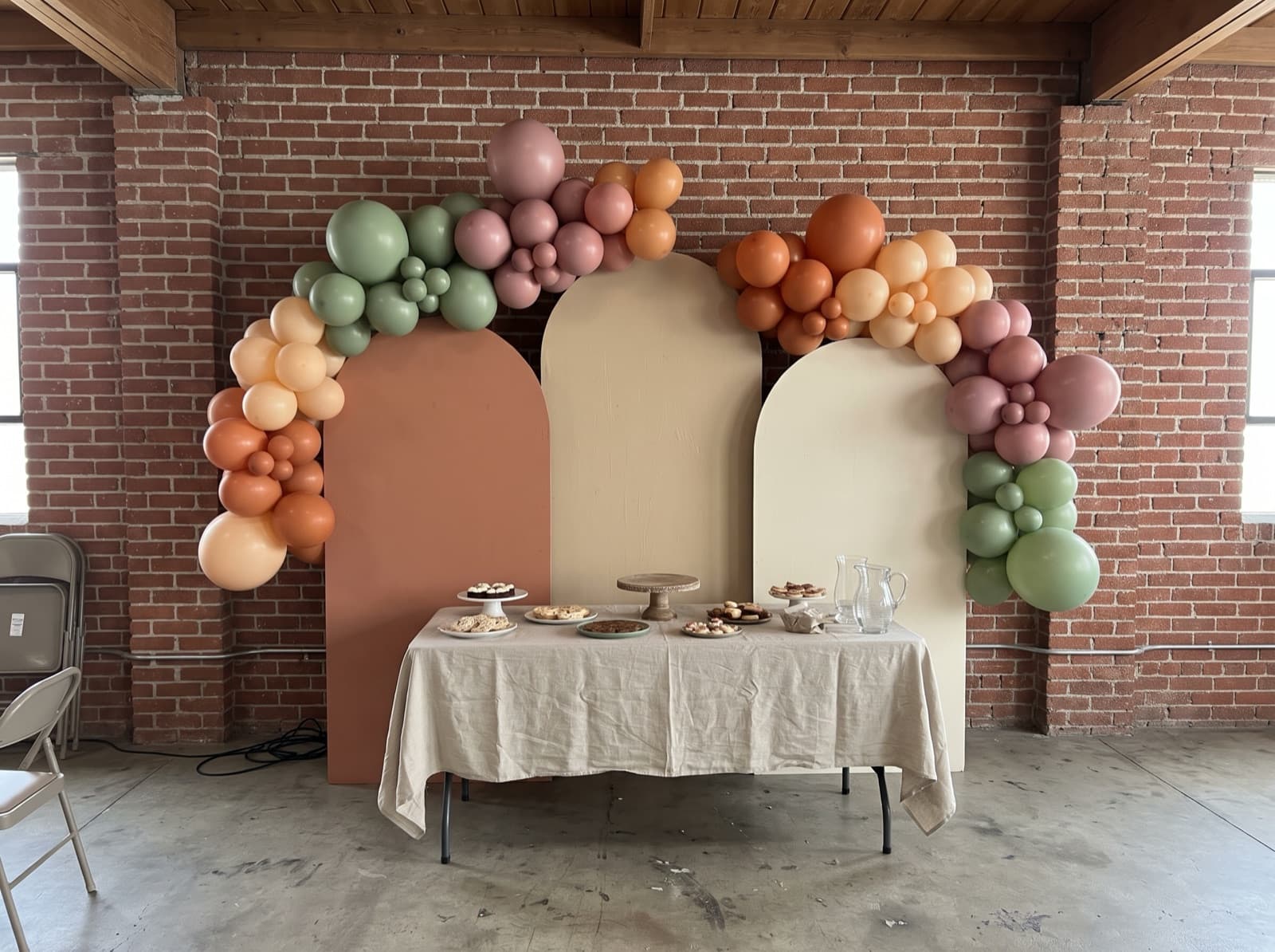 Terracotta, sand and cream chiara trio with a garland