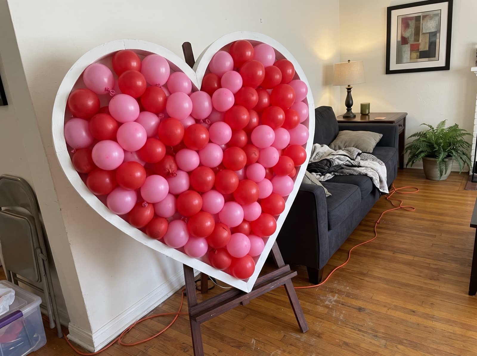 Red and pink heart mosaic on an easel
