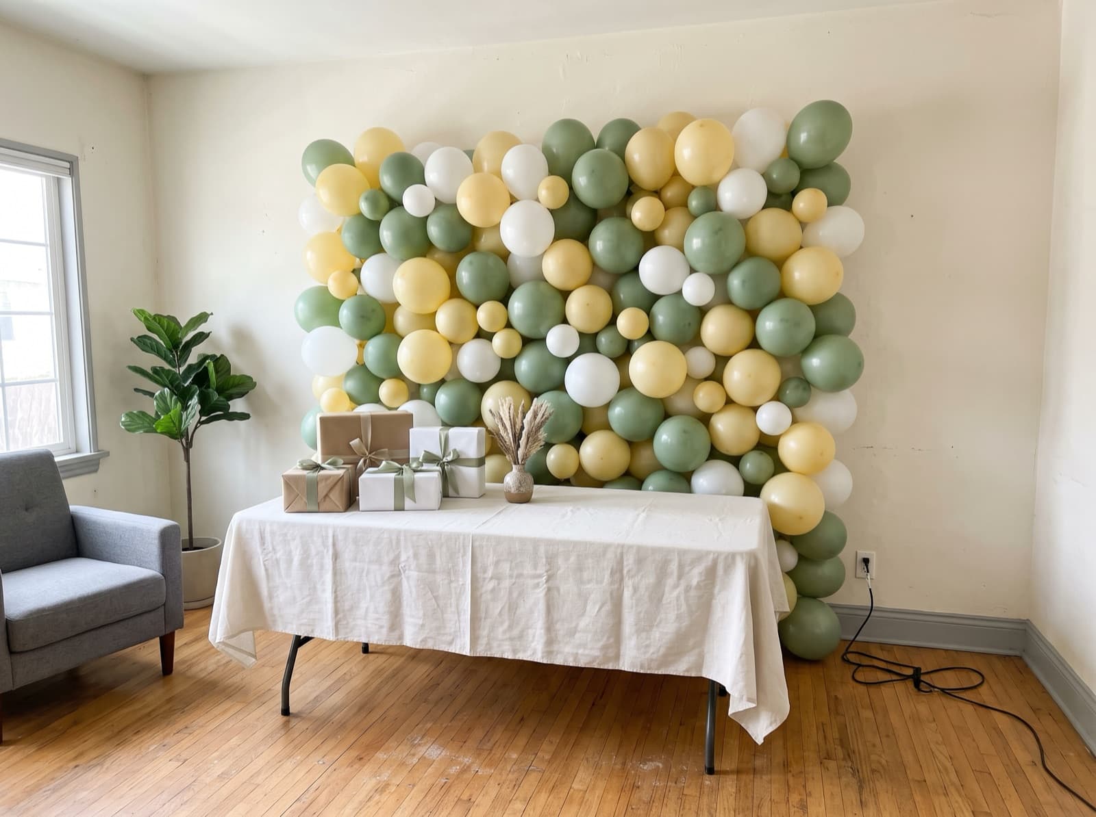 Sage, butter yellow and white wall for a shower gift table